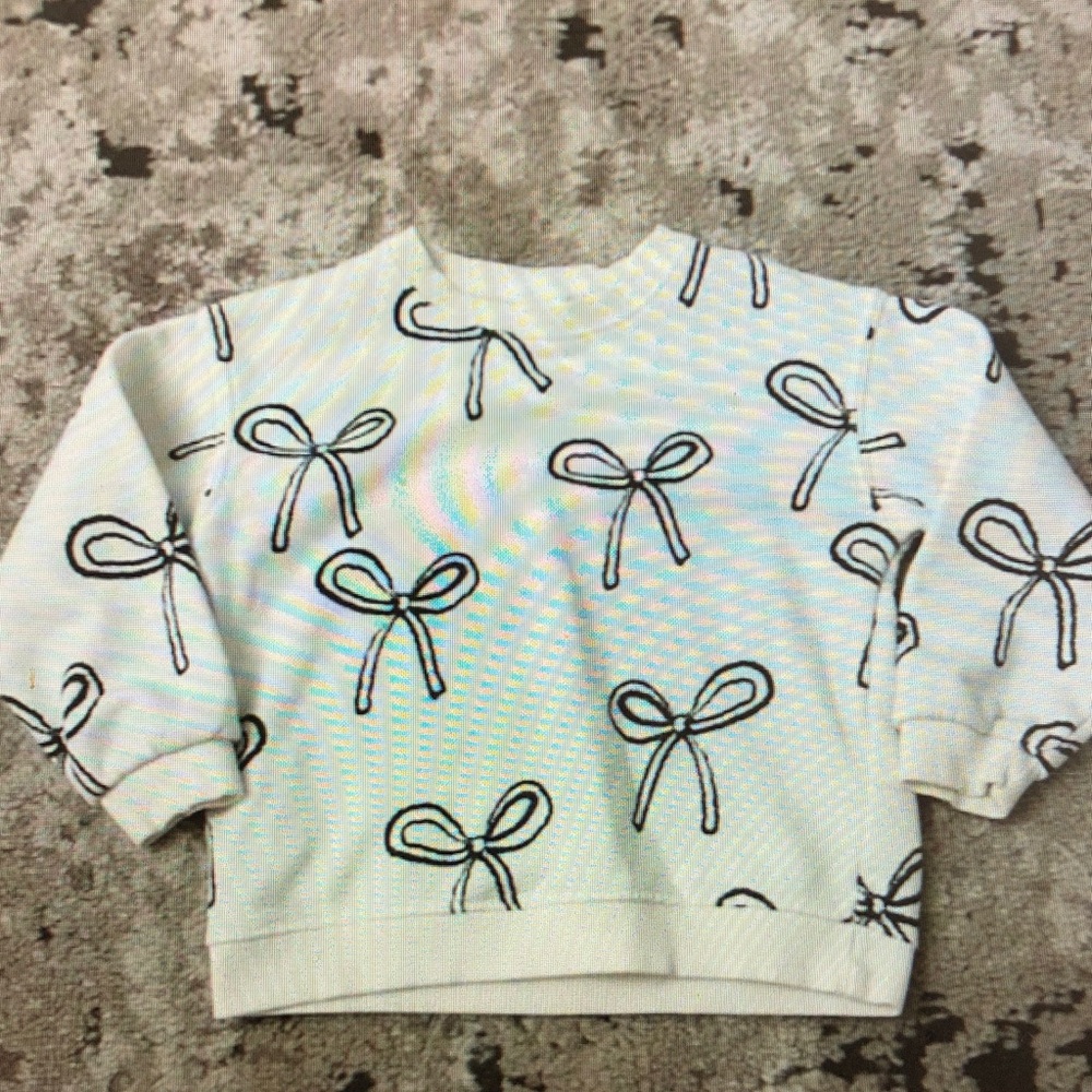 White Sweatshirt with Black Bow Print